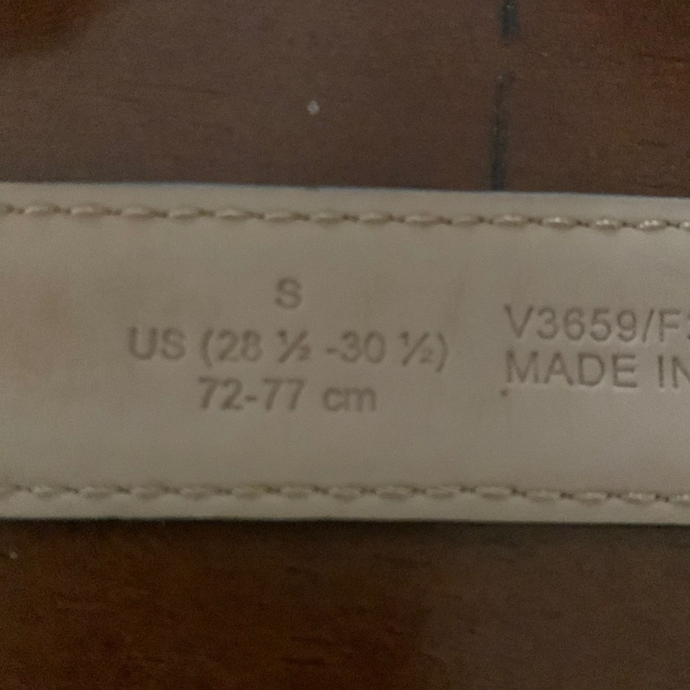 Chase belt slightly worn on inside near notches but perfect condition outside